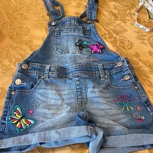 Used girls short jumpsuit size M(7/8)